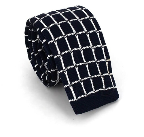 Cravate à pois noir et blanc